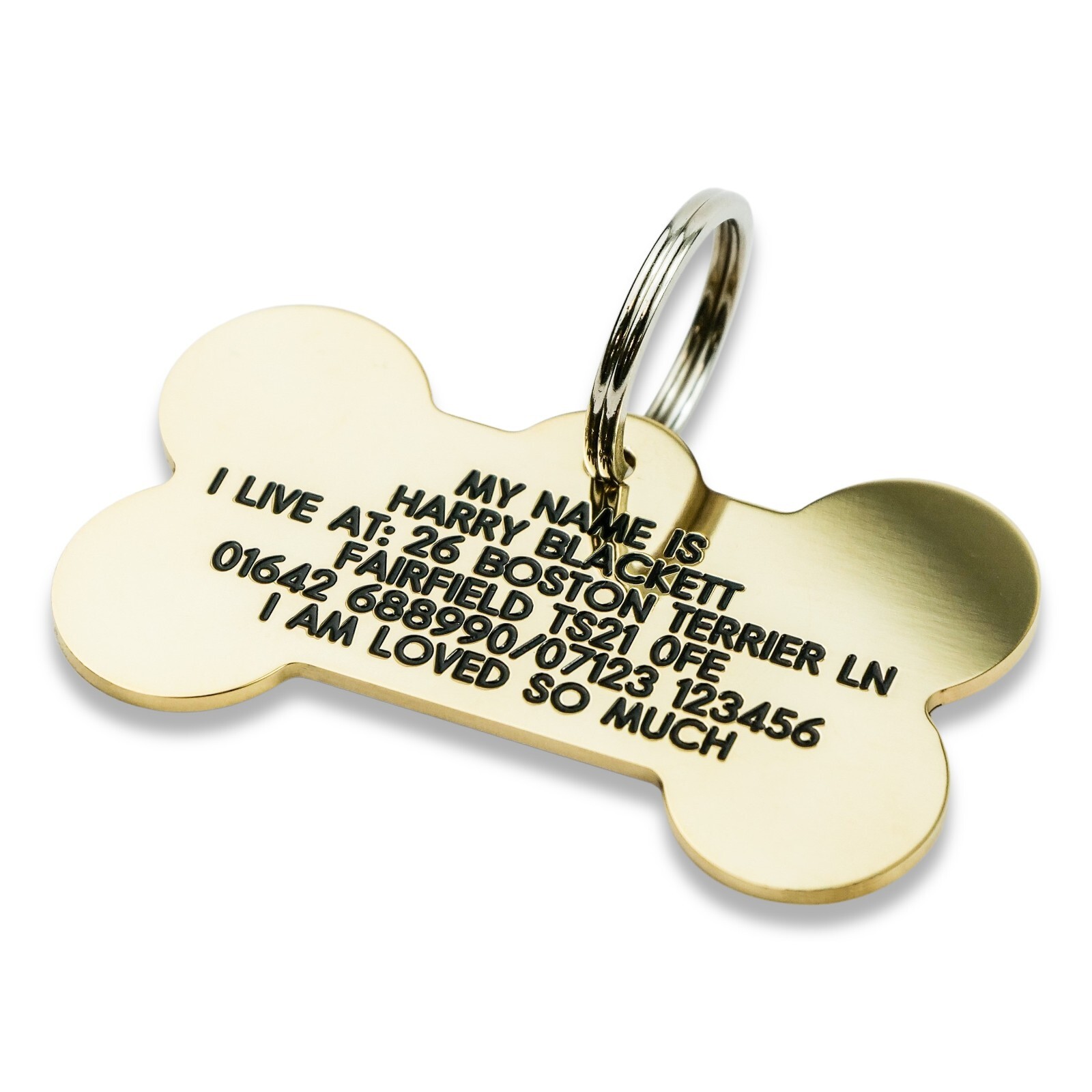 Deeply engraved solid brass dog tag, bone shaped 58mm.Up to 6 lines on each side