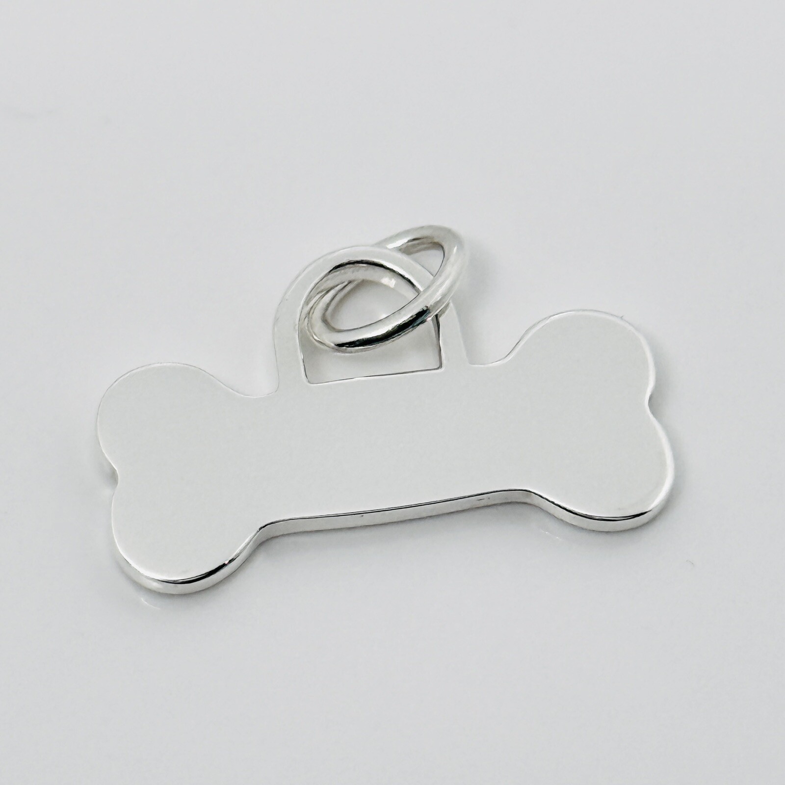Tiffany & Co Dog Bone Pet ID Tag in Sterling Silver Engravable Charm or Pendant