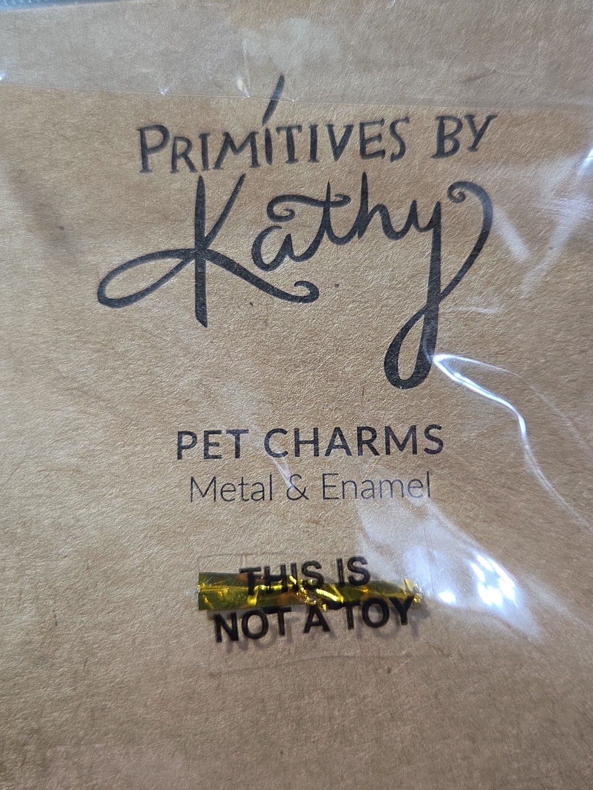 “Dog Hair Don’t Care” enamel pet collar charm by Primitives by Kathy