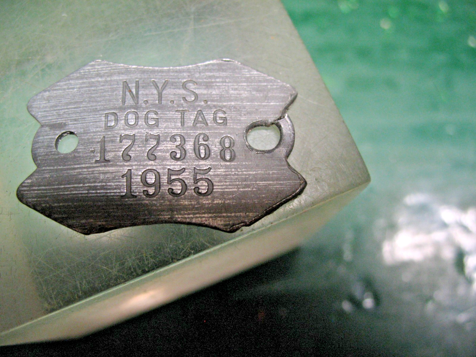 N.Y.S. DOG TAG No. 177368 DATED 1955 NON FERROUS POSSIBLY PEWTER